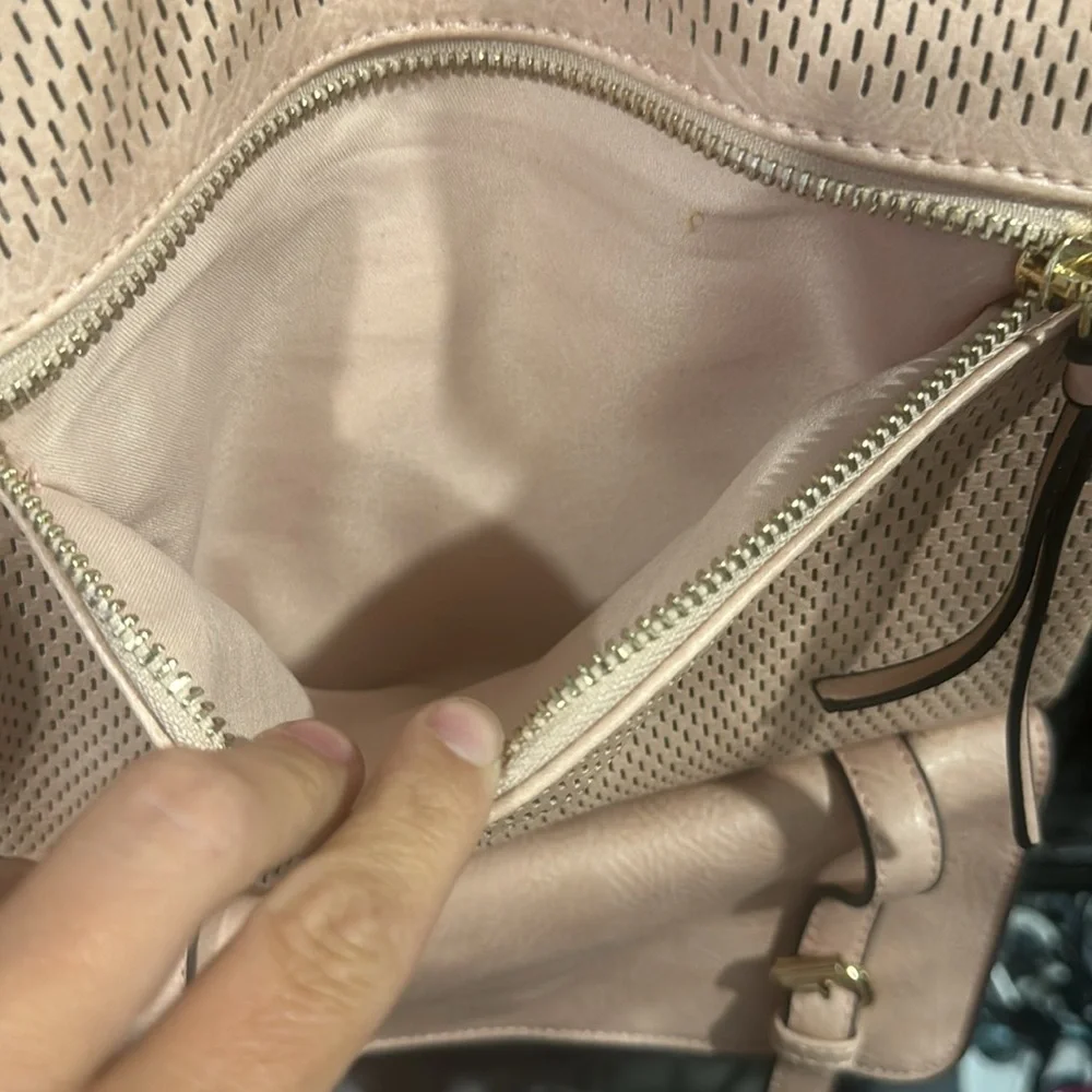 Blush perforated backpack